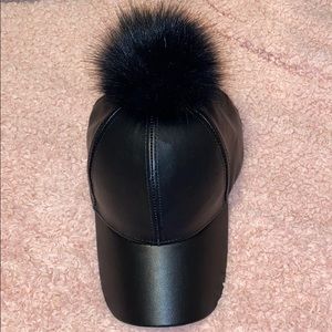 Black fur ball hat